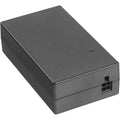 Black rectangular electronic device with a USB port on a white background